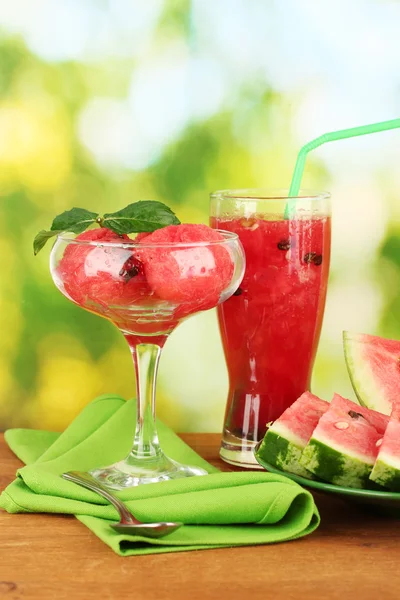 Refreshing desserts of watermelon on green background close-up — Stock Photo, Image