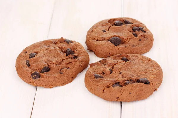 Chocolate chips cookie on wooden background — Stock Photo, Image