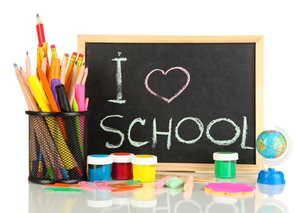 Mesa de escola pequena com vários materiais escolares close-up isolado em branco — Fotografia de Stock