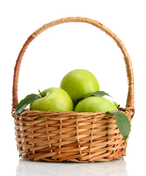 Ripe green apples with leaves in basket isolated on white — Stock Photo, Image