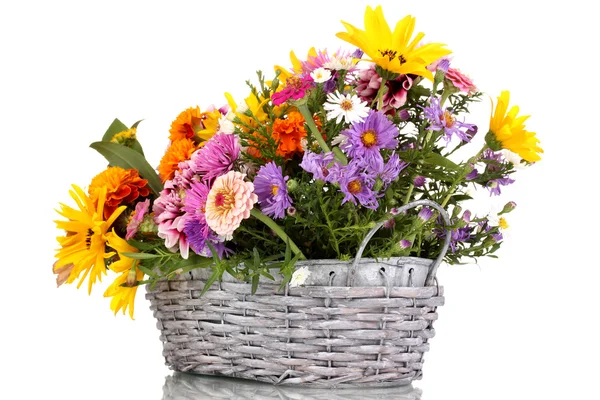 Beautiful bouquet of bright flowers in basket isolated on white — Stock Photo, Image