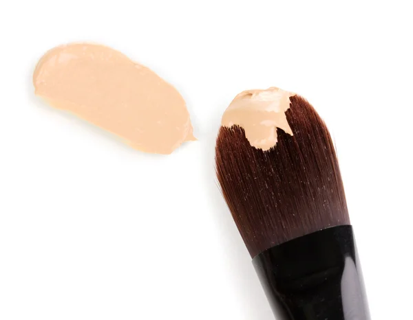 Cosmetic liquid foundation and brush isolated on white — Stock Photo, Image