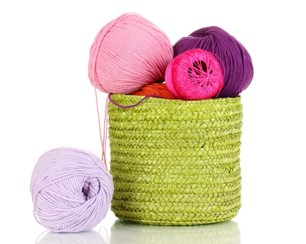 Colorful yarn for knitting in green basket isolated on white — Stock Photo, Image