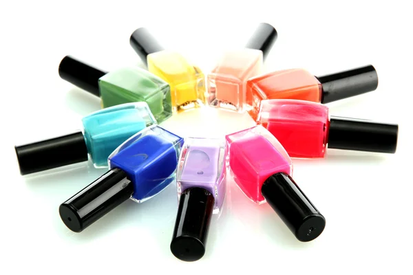 Grupo de esmaltes de uñas brillantes aislados en blanco — Foto de Stock