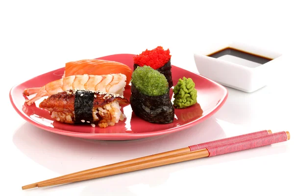 Delicious sushi served on red plate isolated on white — Stock Photo, Image