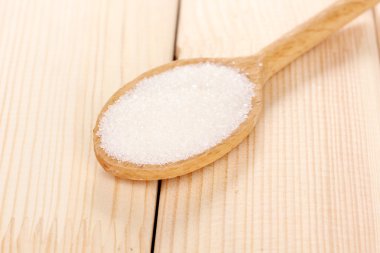 kaşık ahşap zemin üzerinde beyaz şeker