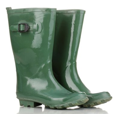 Yeşil gumboots üzerinde beyaz izole