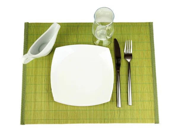 Configuração de mesa em um tapete de bambu — Fotografia de Stock