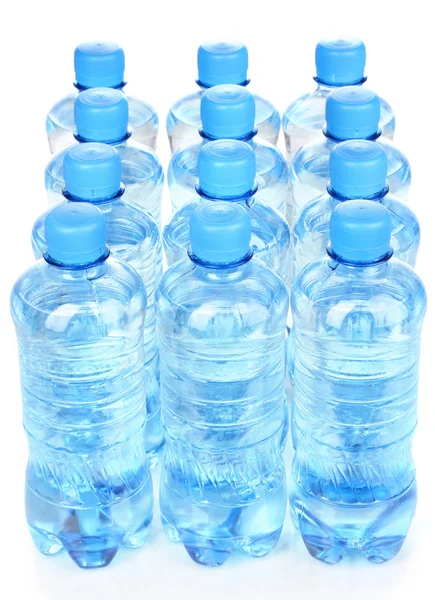 Plastic bottles of water isolated on white — Stock Photo, Image