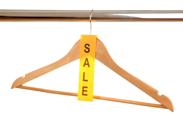 Wooden clothes hanger as sale symbol isolated on white — Stock Photo, Image