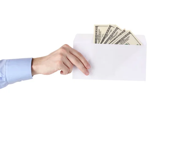 Man's hand holding an envelope with dollars on white background — Stock Photo, Image