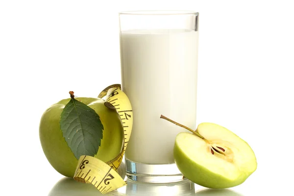 Glass of kefir, green apples and measuring tape isolated on white — Stock Photo, Image