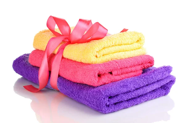 Colorful towels with ribbon isolated on white — Stock Photo, Image