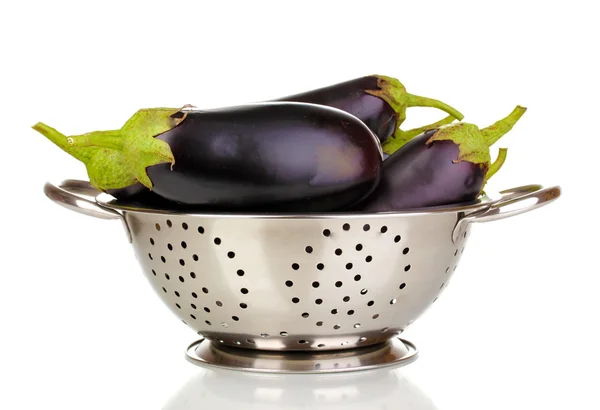 Fresh eggplants in colander isolated on white — Stock Photo, Image