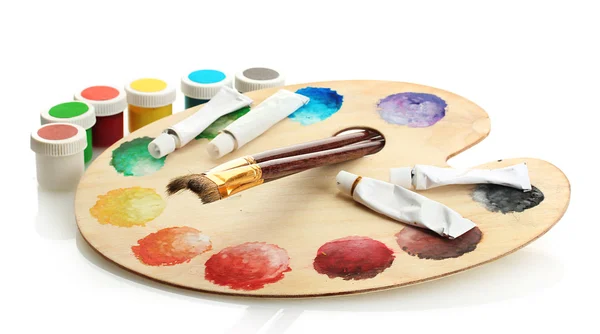 Wooden art palette with paint and brushes isolated on white — Stock Photo, Image