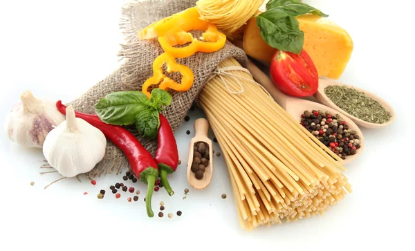 Pasta spaghetti, vegetables and spices, isolated on white — Stock Photo, Image