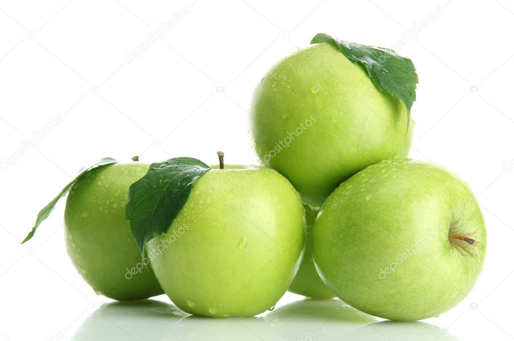 Ripe green apples with leaves isolated on white