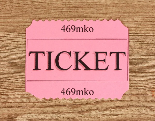 Colorful ticket on wooden background close-up — Stock Photo, Image