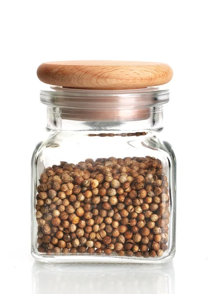 Jar of coriander seeds isolated on white — Stock Photo, Image