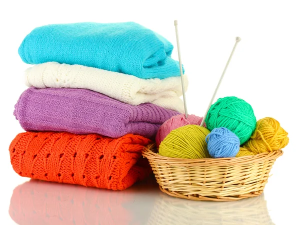 Sweaters and balls of wool isolated on white — Stock Photo, Image