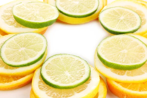 Oranje kalk en citroen close-up geïsoleerd op wit — Stockfoto