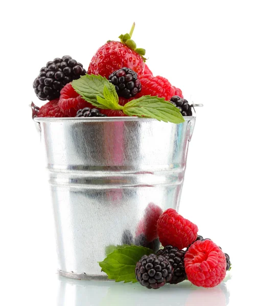 Beautiful berries with leaves in bucket isolated on white — Stock Photo, Image