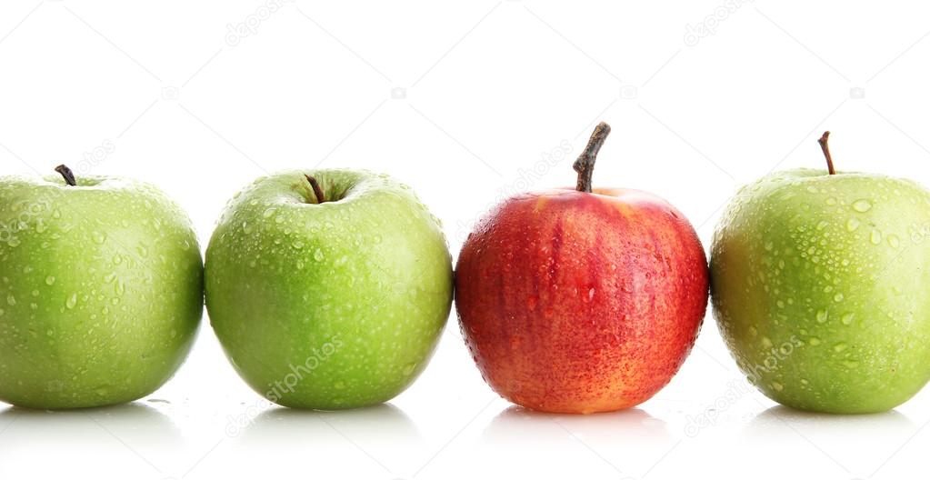 Ripe green apples and one red apple isolated on white