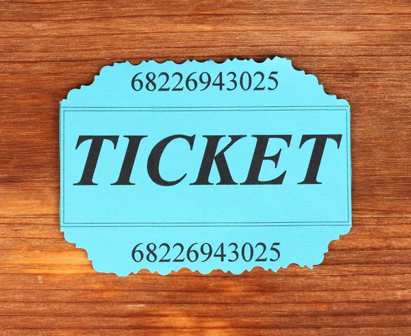 Colorful ticket on wooden background close-up — Stock Photo, Image