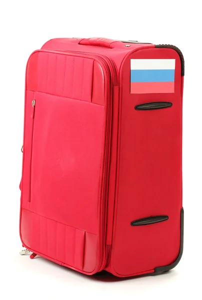 Red suitcase with sticker with flag of Russian Federation isolated on white — Stock Photo, Image