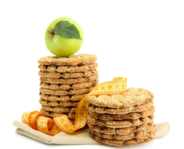 Smakelijke knäckebröd, apple en meetlint, geïsoleerd op wit — Stockfoto