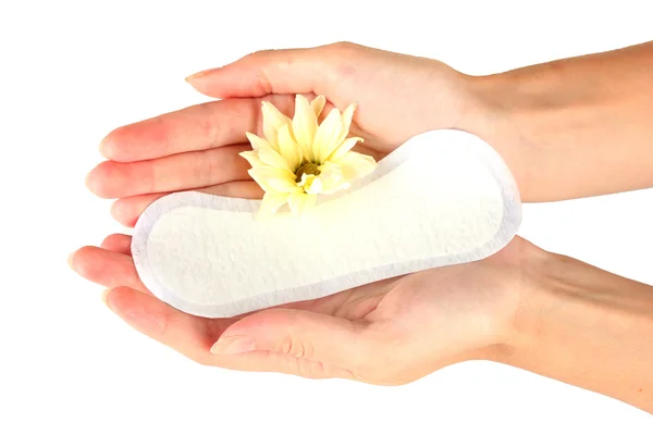 Woman's hands holding a daily sanitary pad on white background close-up — Stock Photo, Image