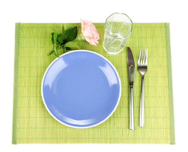 Table setting on a bamboo mat