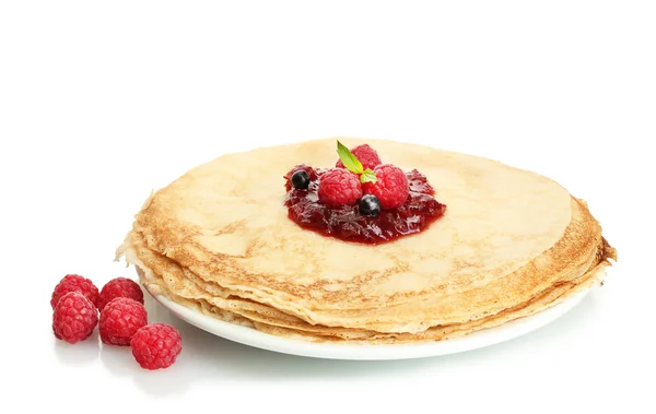 Delicious pancakes with berries and jam on plate isolated on white — Stock Photo, Image