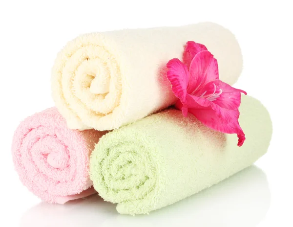 Bright towels and flower isolated on white — Stock Photo, Image