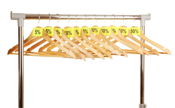 Wooden clothes hangers as sale symbol isolated on white — Stock Photo, Image