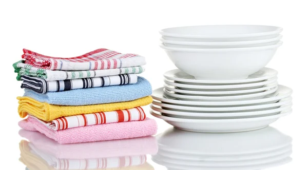 Kitchen towels with dishes isolated on white background — Stock Photo, Image