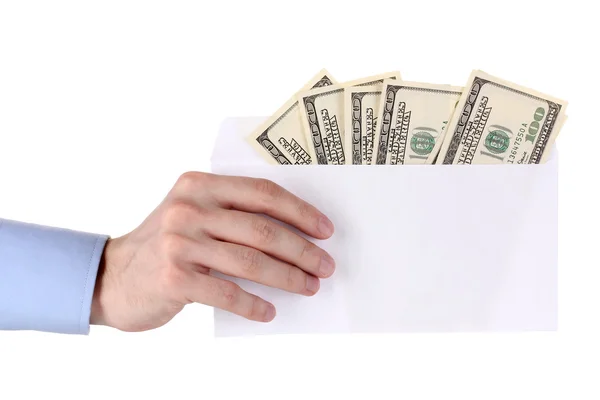 Man's hand holding an envelope with dollars on white background — Stock Photo, Image