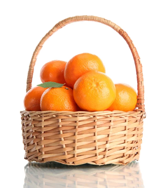 Tangerines with leaves in a beautiful basket isolated on white Royalty Free Stock Photos