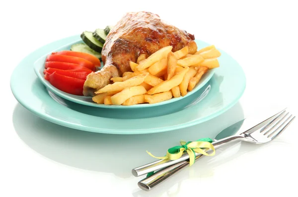 Roast chicken with french fries and vegetables on plate, isolated on white — Stock Photo, Image