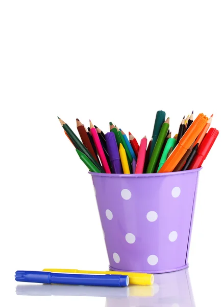 Colorful pencils and felt-tip pens in purple pail isolated on white — Stock Photo, Image