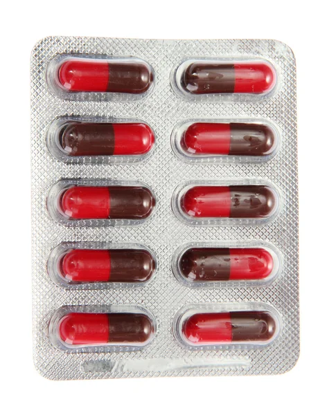 Capsules packed in blisters, isolated on white — Stock Photo, Image