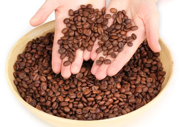 Grãos de café em mãos isoladas em branco — Fotografia de Stock