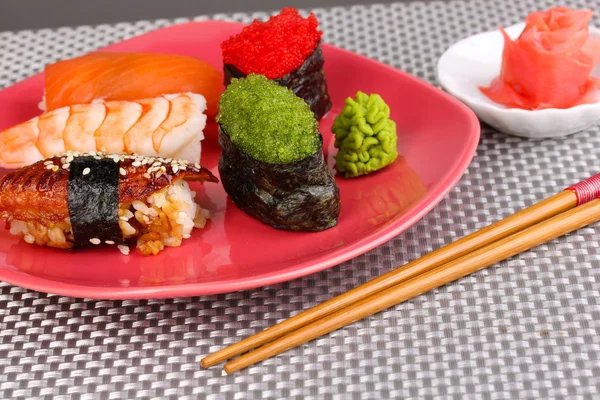 Delicious sushi served on plate close-up — Stock Photo, Image