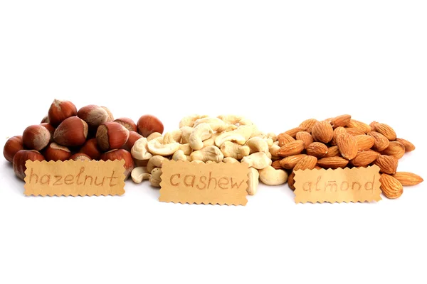 Sortiment chutných ořechů, izolované na bílém — Stock fotografie