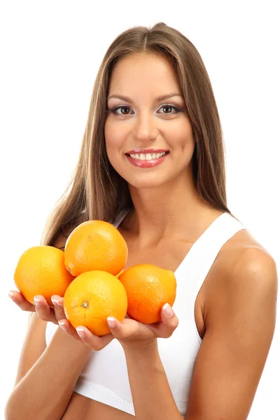 Hermosa joven con naranjas, aislado en blanco — Foto de Stock