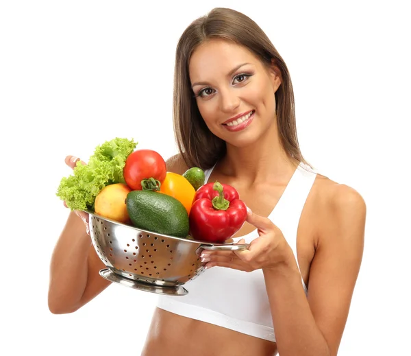 Hermosa mujer joven con verduras en colador, aislado en blanco — Foto de Stock