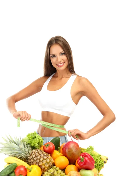 Gyönyörű fiatal nő gyümölcsök és zöldségek, elszigetelt fehér — Stock Fotó