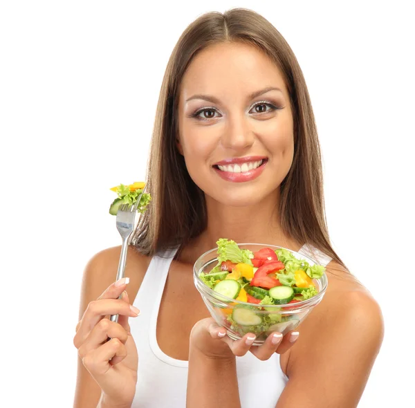 Krásná mladá žena se salátem, izolovaná na bílém — Stock fotografie
