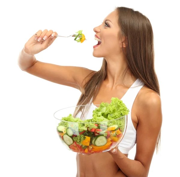 Bela jovem com salada, isolada em branco — Fotografia de Stock