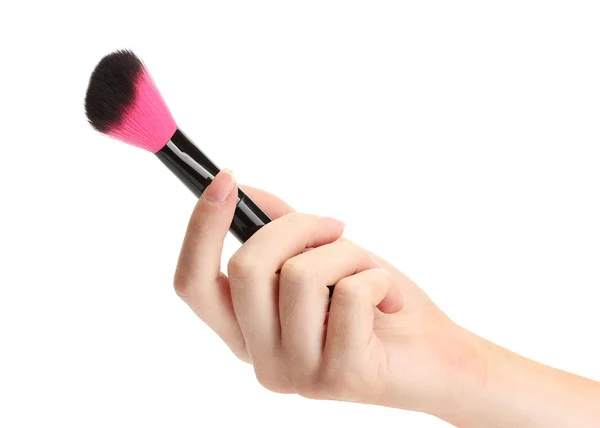 Mano con cepillo negro para maquillaje aislado en blanco — Foto de Stock